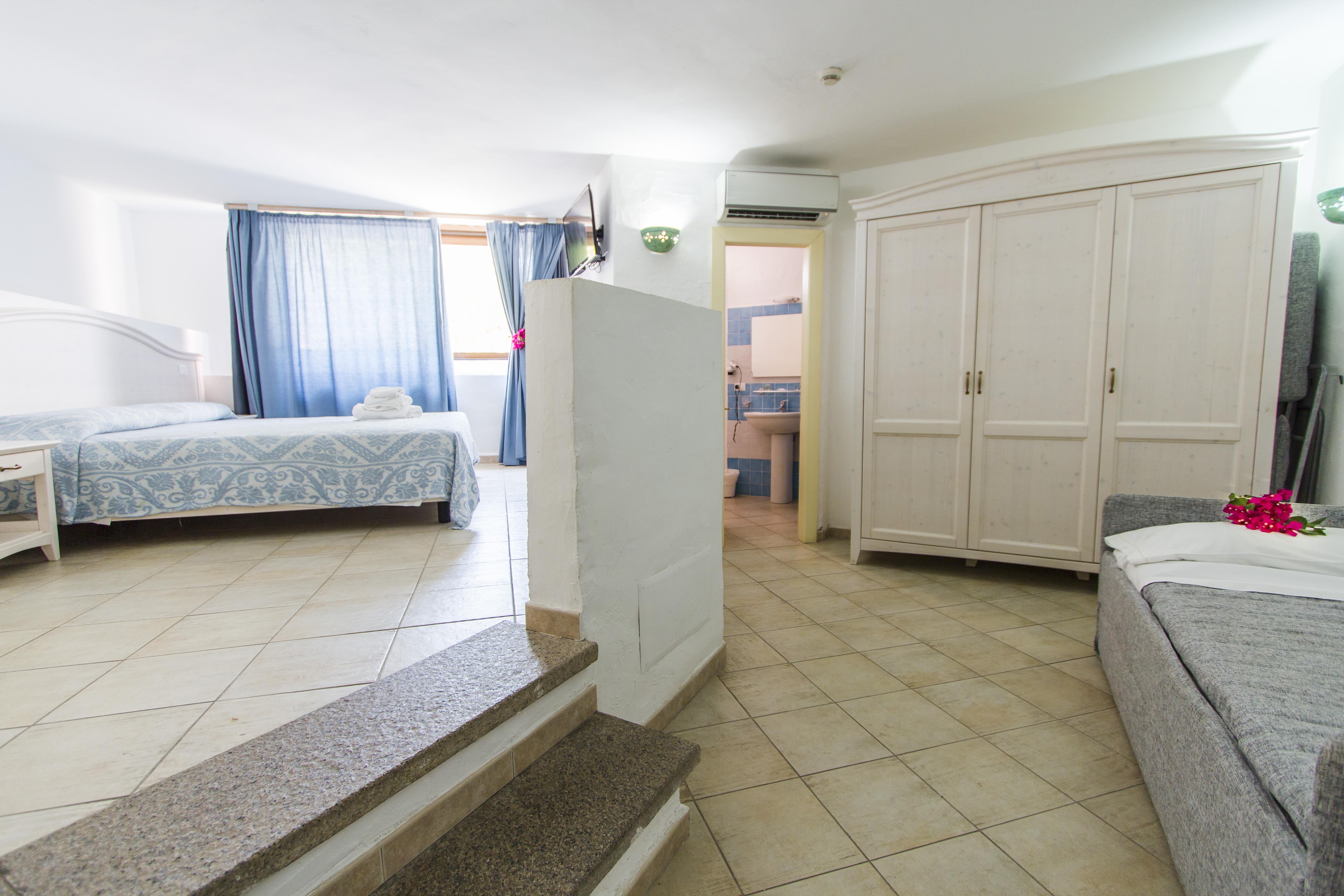 Hotel Li Graniti Байя Сардиния Экстерьер фото