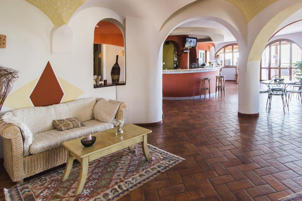 Hotel Li Graniti Байя Сардиния Экстерьер фото