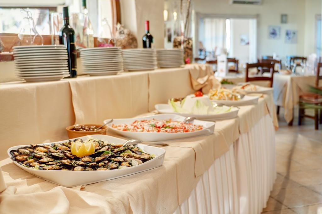 Hotel Li Graniti Байя Сардиния Экстерьер фото